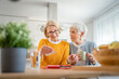 © Miljan Živković - Senior mature women friends or sisters looking family photos album