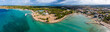 Zaton, Croatia - Aerial wide panoramic view of Zaton tourist waterfront with turquoise sea water, Nin village and Velebit mountains at background on a sunny summer day in Dalmatia region of Croatia