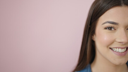 Canvas Print - Young beautiful hispanic woman smiling confident standing over isolated pink background