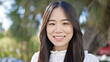 © Krakenimages.com - Young chinese woman smiling confident standing at park