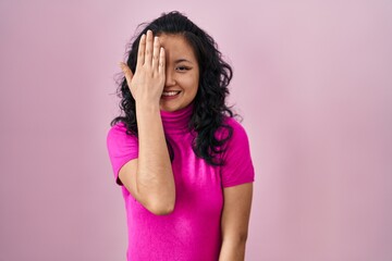 Sticker - Young asian woman standing over pink background yawning tired covering half face, eye and mouth with hand. face hurts in pain.