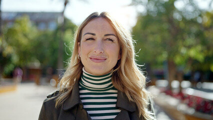 Poster - Young beautiful hispanic woman smiling confident at park