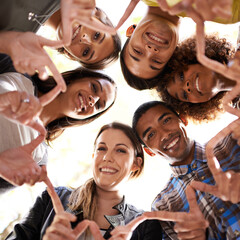 Finger star, circle and portrait of friends with diversity, unity and collaboration with a low angle. Teamwork, smile and group of multiracial people in huddle together for solidarity and community.