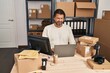 © Krakenimages.com - Middle age man ecommerce business worker using laptop at office