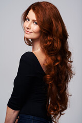 Poster - Red head, hair care and portrait of woman for wellness, keratin treatment and haircare on white background. Beauty salon, hairdresser and ginger female model with shine, healthy and natural hairstyle