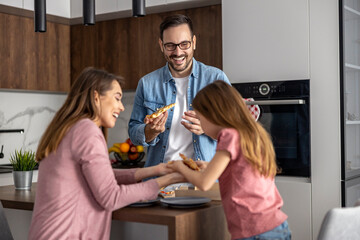 Sticker - Happy family eating pizza at home