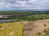 Fototapeta Do pokoju - Blooming rapeseed field near village of Kostievo, Bulgaria