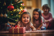 © wetzkaz - christmas in the living room, toddler, girl sitting on the floor in front of a christmas tree with christmas presents, family and siblings on christmas eve