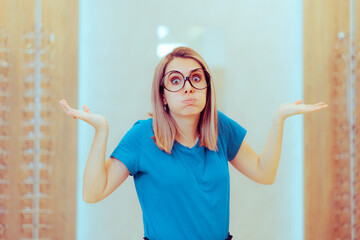 Poster - Girl with Huge Round Eyeglasses Trying to find Better Frames. Woman wearing ridiculous glasses shopping for a new pair 
