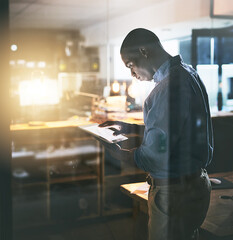 Leinwandbilder - Professional black man, tablet and night business, information technology and software update. Male programmer work late, overtime and deadline with focus, concentration and cyber security upgrade