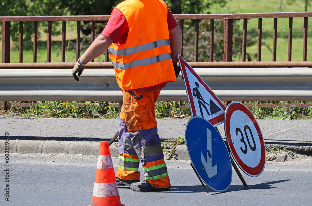 Construction worker at the road construction site