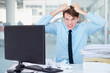 © Anton R/peopleimages.com - Portrait, stress or pulling hair with a businessman in an office, feeling anger while working on a problem or crisis. Audit, tax and compliance with a young employee suffering from burnout at work