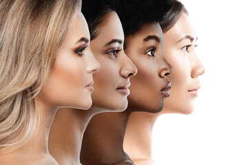 Wall Mural - multi-ethnic diversity and beauty - group of different ethnicity women against white background