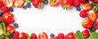 © Iryna Melnyk - Frame banner made of fresh strawberry, raspberry and blueberry on white background, top view, flat lay. Creative food concept with copy space
