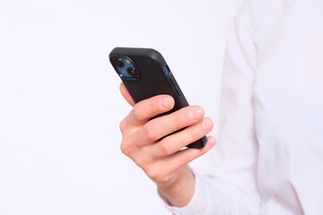 Wall Mural - Businesswoman holds a smartphone