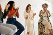 © Jacob Lund - Happy businesswomen celebrating their achievement during a conference meeting