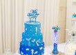 Blue three floors cake in blue, with mis quince anos in spanish
