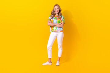 Sticker - Full length photo of charming confident lady wear flower print t-shirt smiling arms crossed isolated yellow color background