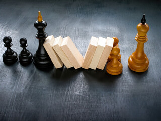 Chess and blocks as boss and leader symbols.