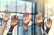 © Ruan J/peopleimages.com - Group, hands palm and diversity people in a office meeting with question at work. Collaboration, teamwork job and solidarity of worker with arms and hand raised in workplace with team community