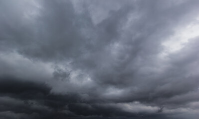 Aufkleber - The dark sky with heavy clouds converging and a violent storm before the rain.Bad or moody weather sky and environment. carbon dioxide emissions, greenhouse effect, global warming, climate change