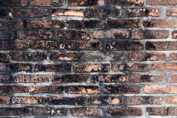 Sticker - Grunge old and crack red color brick with black stain wall textured background.