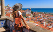 canvas print picture - Woman tourist enjoying panoramic view of Lisbon city landscape- Portugal