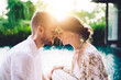 © BullRun - Caucaisan couple in love having holistic healing retreat for reunion togetherness during summer honeymoon at villa terrace, calm husband and wife meditate during teamwork therapy at yoga practice