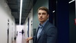© stockbusters - Pensive employee walking office hallway closeup. Tired man executive leaving