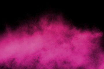 Wall Mural - pink powder explosion on black background.