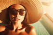© Mr. Bolota - Pool Sun-Kissed Beauty. Stunning sexy woman with straw hat basking in golden hour light, laying on poll water waves. Bikini, skincare, summer and topless concept AI Generative