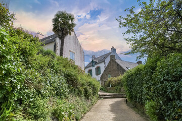 Wall Mural - Brittany, Ile aux Moines island in the Morbihan gulf, small street and beautiful houses in the village
