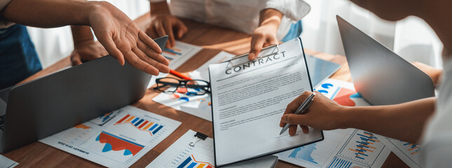 Poster - Panorama shot hand signing signature on legal contract, business report and BI Fintech paper on table. Seal business agreement deal with signature. Investment loan for startup company. Scrutinize
