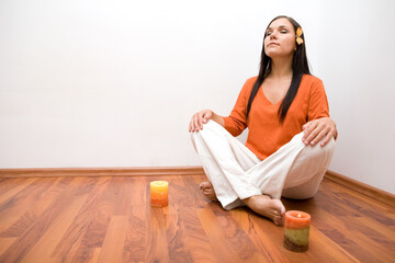 Canvas Print - attractive brunette woman meditation at home