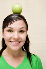 Sticker - attractive brunette woman holding apple