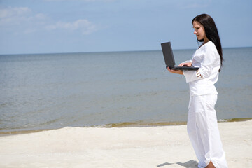 Sticker - attractive brunette woman relaxing on the beach