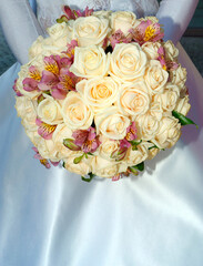 Sticker - A shot of wedding sweet bouquet in brides hands