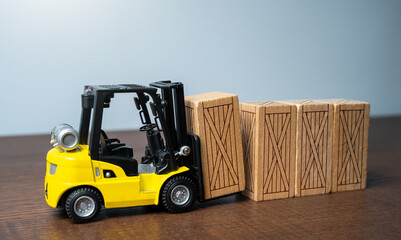 Wall Mural - Forklift stacks wooden crates. Transportation industry. Transport department. Warehousing and logistics concept.