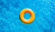 © ADDICTIVE STOCK - Generative AI illustration of bright yellow inflatable tube floating on blue clear water of swimming pool on sunny summer day