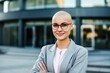 Attractive young elegant caucasian business woman with her head shaved looking at the camera. Generative AI