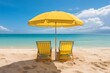Bright yellow beach chairs and beach umbrella on a Caribbean blue beach facing the ocean, vacation