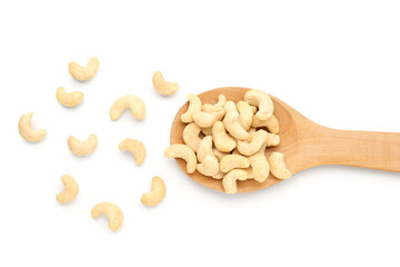 Spoon with tasty cashew nuts isolated on white background