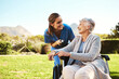 © Chanelle Malambo/peopleimages.com - Senior woman, nurse and wheelchair for healthcare support, life insurance or garden at nursing home. Happy elderly female and caregiver helping patient or person with a disability in nature outdoors