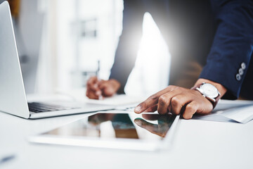 Leinwandbilder - Professional, man and laptop for research on tablet at work for analysis about career at desk. Businessman, hand and email for online at a workplace with a digital screen for communication on web.