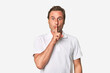 © Asier - A middle-aged man isolated keeping a secret or asking for silence.
