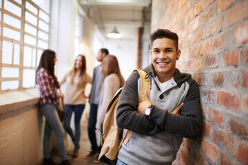 Aufkleber - Education, arms crossed and portrait of man in school hallway for studying, college and scholarship. Future, happy and knowledge with student leaning on brick wall for university, academy and campus