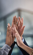 © K Seisa/peopleimages.com - Business people, hands and high five for teamwork, success or winning together at office. Group touching hand in team win, victory or achievement for company goals, unity or solidarity at workplace