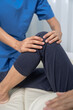 © M+Isolation+Photo - Female asian physiotherapist worker giving leg massage to senior woman, closeup. Rehabilitation physiotherapy in rehabilitation center, muscle weakness, Calf and knee pain