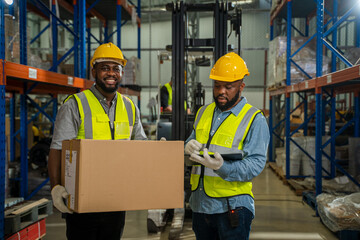 Aufkleber - Warehouse worker checking stock products in a large distribution warehouse.,Warehousing, Logistics in stock.