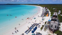 Beautiful Cinematic Aerial View Of The Bahamas Island - Turquoise Oceans, Water Sports Sailing, Beach Walks, Water Bikes 